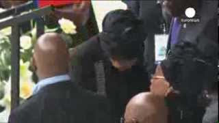 Mandelas widow Graca Machel and exwife Winnies hug at memorial ceremony in Soweto [upl. by Dyraj]