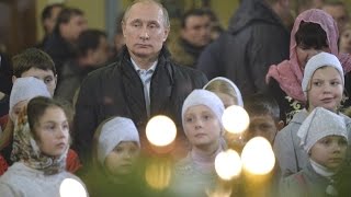 Putin attends Russian Orthodox Christmas Eve Mass [upl. by Akaya906]