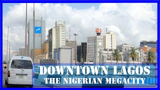 Downtown LAGOS NIGERIA  Discover the African megacity  From Balogun market to VI Ikoyi and Lekki [upl. by Ahtael]