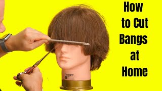 How to Cut Bangs at Home  TheSalonGuy [upl. by Billmyre]